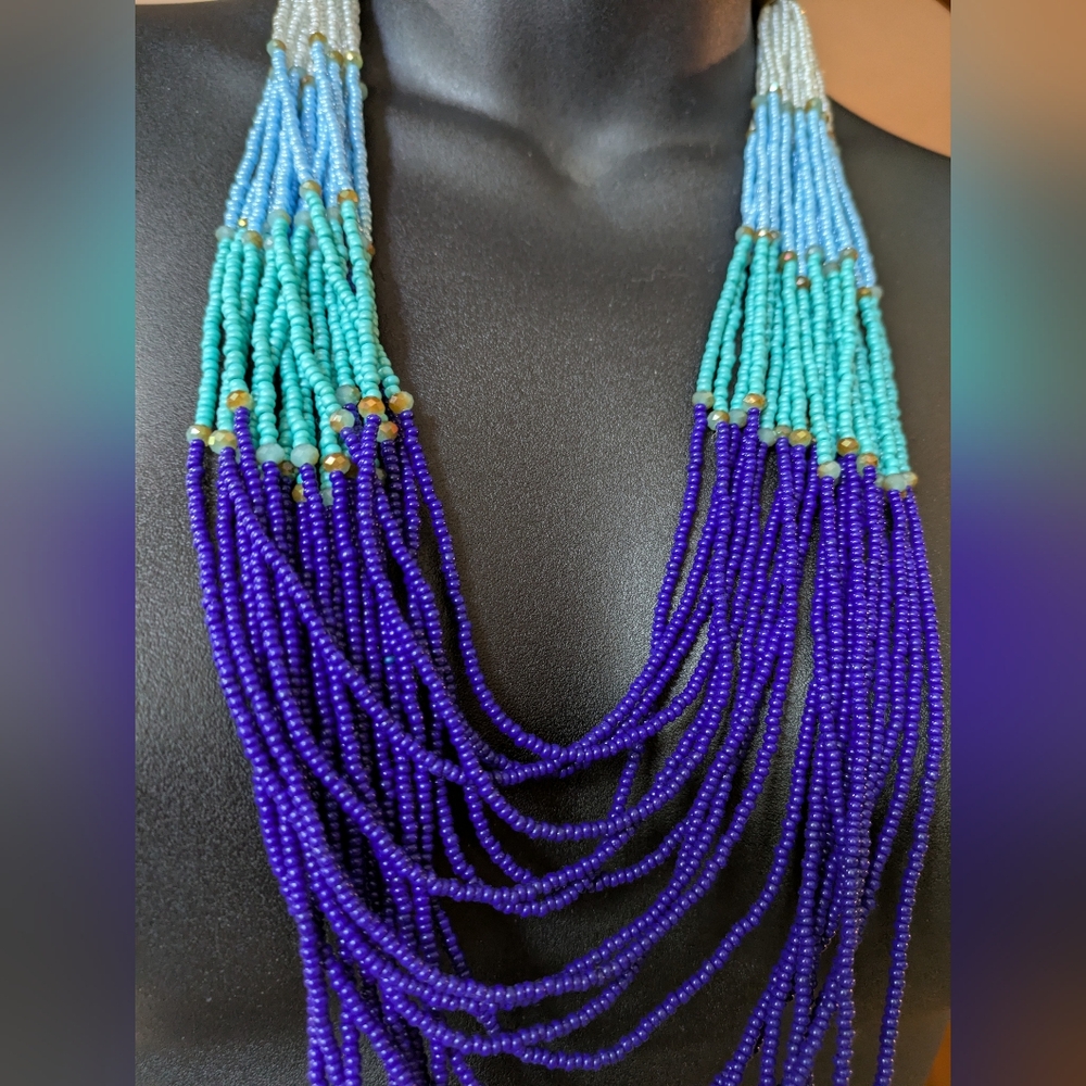 Elegant Shades of Blue And White 20 String Beaded Necklace.